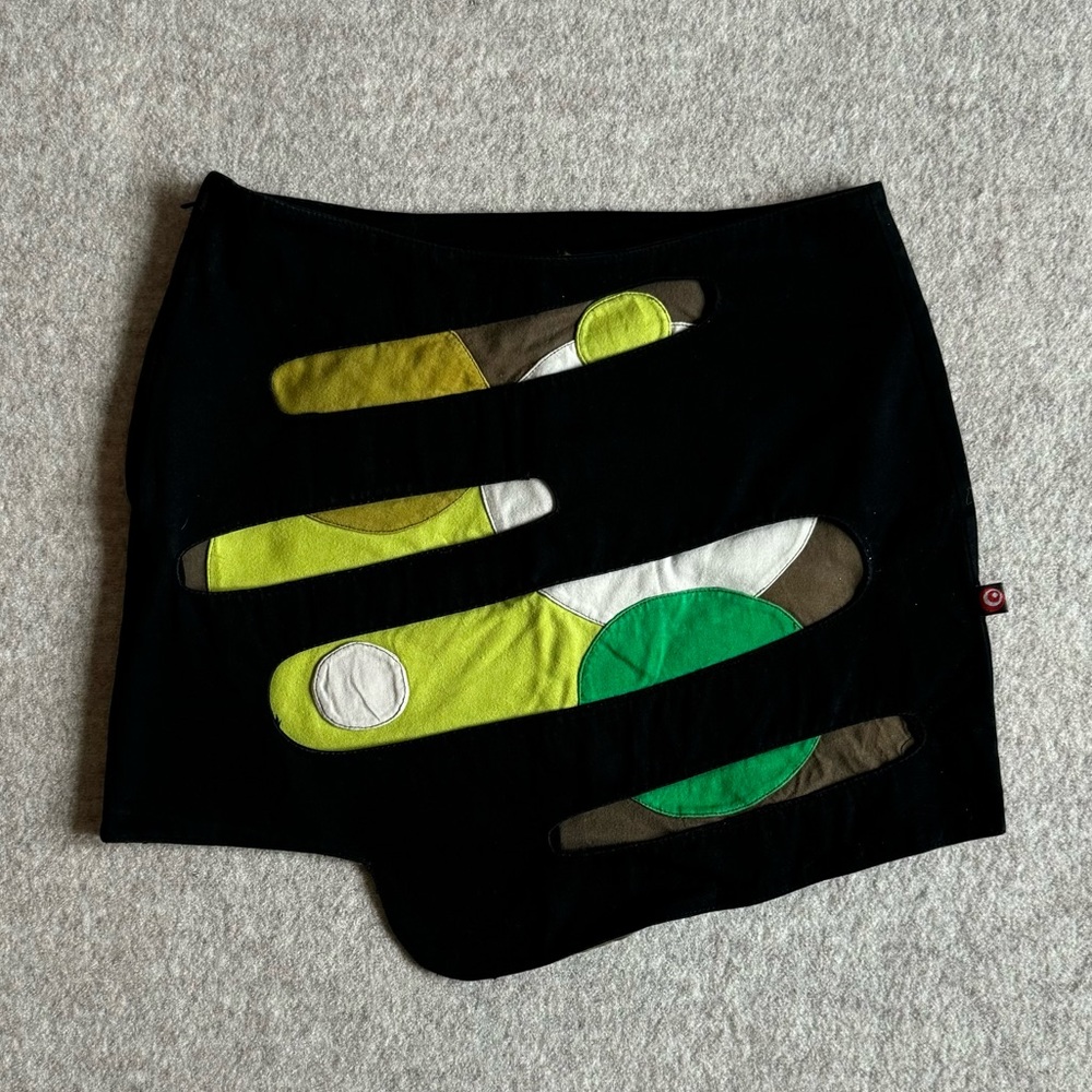 Pygmees asymmetrical black and green mini skirt with cut outs on the front
